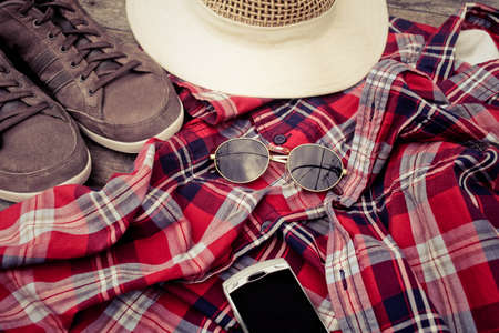 Clothing accessories, shirts, hat and sneakers , smartphoneの写真素材