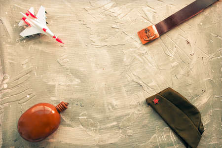 Fighter, navy, pilot and army belt with a sickle and hammer image on a white background. Copy spaceの写真素材