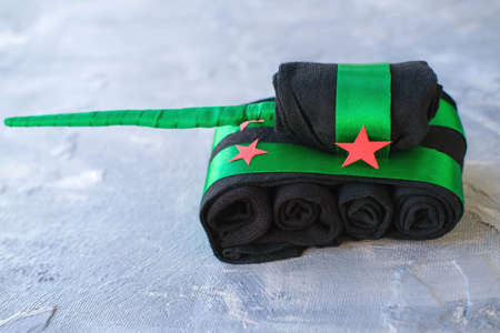 Tank of socks on gray background. Gift Ideas for Father, Husband, Brother, Grandfather by February 23, Defender Fatherland Day, May 9. Handmade. DIY concept. Step by step photo instructions. Step 11の写真素材