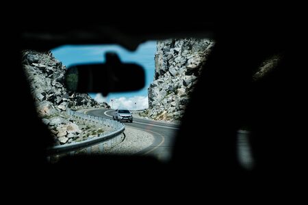 The view from the car window on the road in the mountains of Altai mountainsの写真素材
