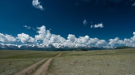 Field road in the foothills of the Altai mountainsの写真素材