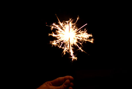 Spark flare new years sparkling candle effectの写真素材