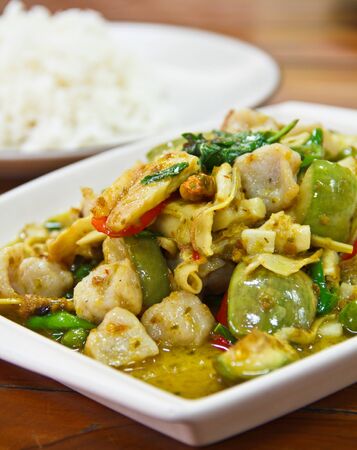 Green Curry on white plate with riceの写真素材