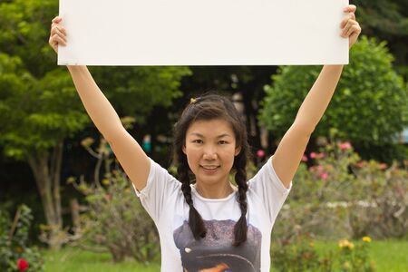 Portrait of a sexy young female smiling in a park - Outdoorの写真素材