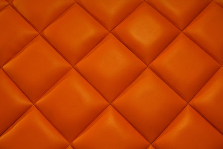 Orange leather texture of the background.