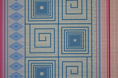 Patterns of blue cloth on a white background.