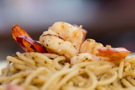Delicious spaghetti with shrimps and spicy sauce.の写真素材