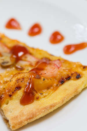 slice pizza with shrimp  and mushroomsの写真素材