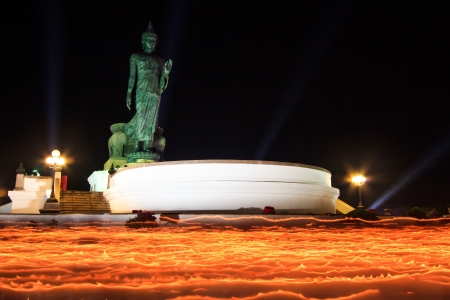Walk with lighted candles in hand around a templeの写真素材