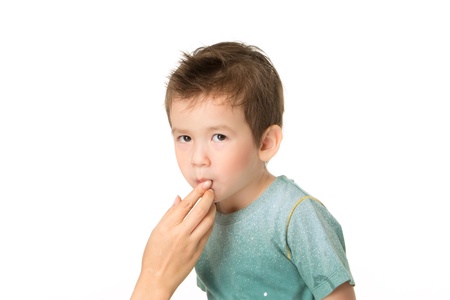 Old boy cute white backdrop.の写真素材