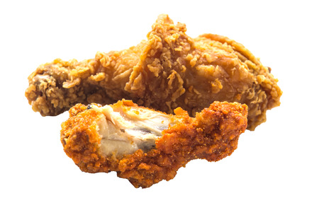 Fried chicken to eat it on a wooden table.の写真素材