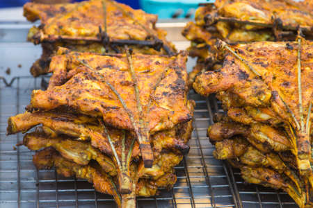 Grilled chicken sold in the local markets of Asia.の写真素材