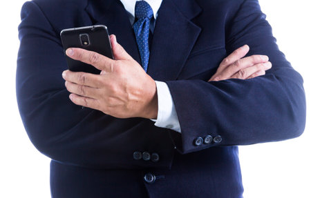 businessman holding a smartphoneの写真素材