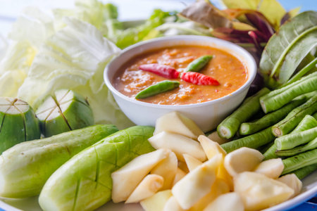 Thai chilli paste with vegetables in plateの写真素材