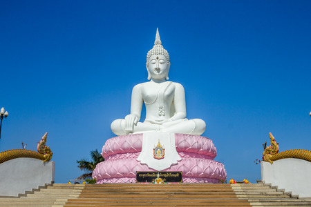 Beautiful white large buddha statue in thailand.の写真素材