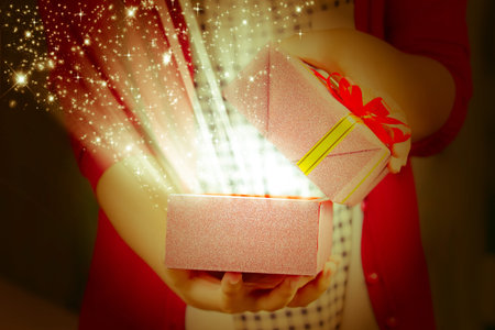 girl open a box gift for special Day
