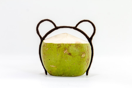 close up cute green coconut on white backgroundの写真素材