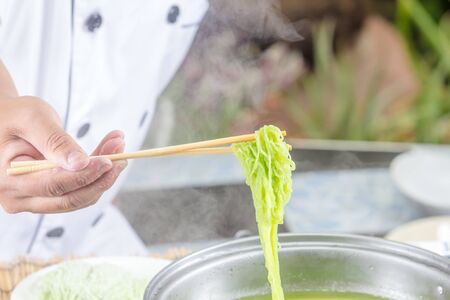 Chef cooking in the kitchen.の写真素材