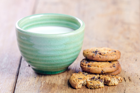 milk and cookies  on woodle tableの写真素材