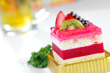 Strawberry cake on white dishの写真素材
