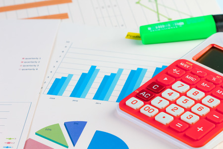 Business graph analysis with calculatorの写真素材