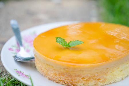 orange cake in plateの写真素材