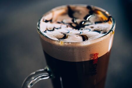 cup of hot cappuccino coffee with milk foamの写真素材