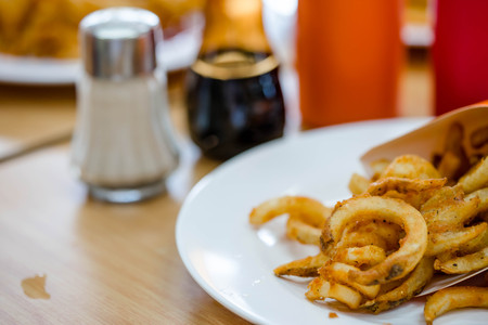Fried Onion Rings and frenfried in plateの写真素材