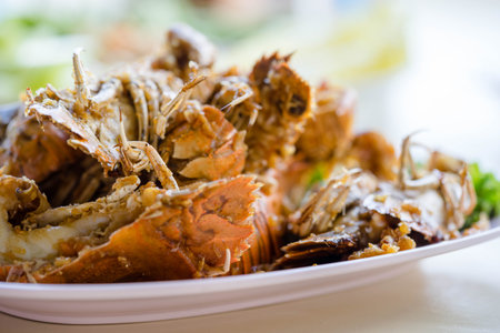 Thai seafood cuisine Deep fried crayfish with garlicの写真素材