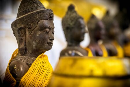 Ancient buddha statue in Thailandの写真素材