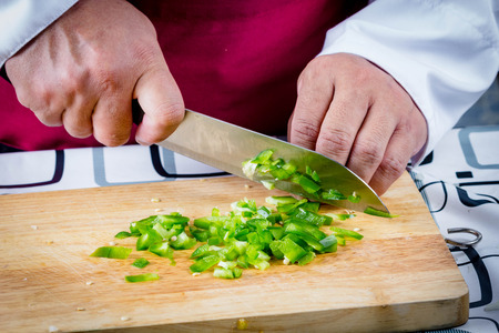 Sliced Green Bell Pepper On Wooden Boardの写真素材