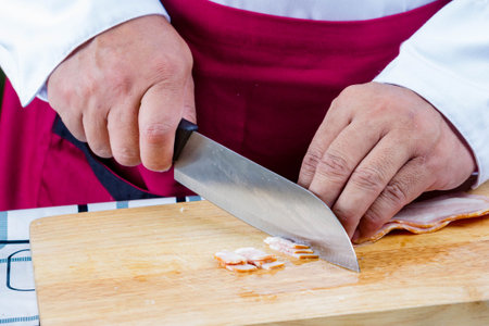 Sliced raw bacon On Wooden Board