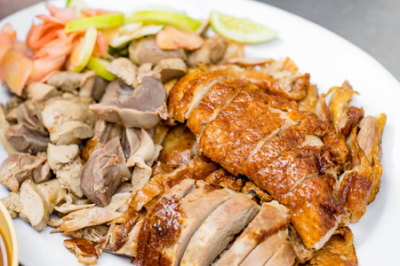 Roasted duck, Chinese style in white plateの写真素材