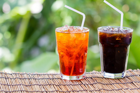 thai milk ice tea on woodenの写真素材