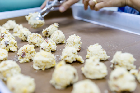 chef making homemade chocolate ship cookiesの写真素材