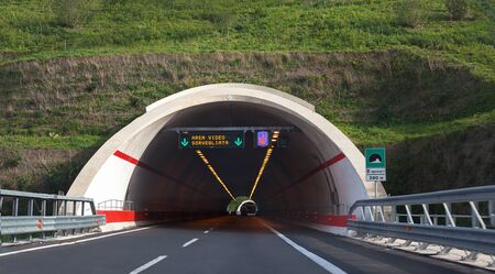 Tunnel through the mountain view from the carの写真素材