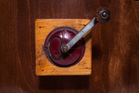Top view of a coffee grinder on wooden surfaceの写真素材