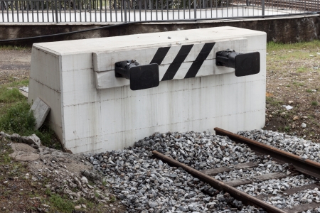 Dead-end track with buffer on a concrete structureの写真素材