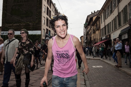MILAN, ITALY - MAY 1: People march in the streets for the traditional May Day parade in Milan on May 1, 2013のeditorial素材