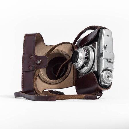 Vintage camera with leather case on grey backgroundの写真素材