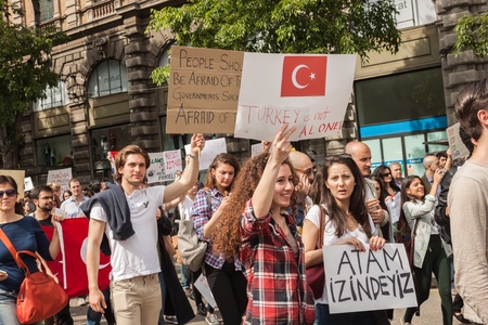 MILAN, ITALY - JUNE 1: Turkish people protest in defence of democracy and against prime minister Erdogan for the violent attacks by riot police at Gezi Park (Istanbul) in Milan JUNE 1, 2013のeditorial素材
