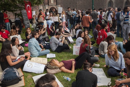 MILAN, ITALY - JUNE 1: Turkish people protest in defence of democracy and against prime minister Erdogan for the violent attacks by riot police at Gezi Park (Istanbul) in Milan JUNE 1, 2013のeditorial素材