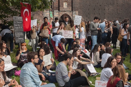 MILAN, ITALY - JUNE 1: Turkish people protest in defence of democracy and against prime minister Erdogan for the violent attacks by riot police at Gezi Park (Istanbul) in Milan JUNE 1, 2013のeditorial素材