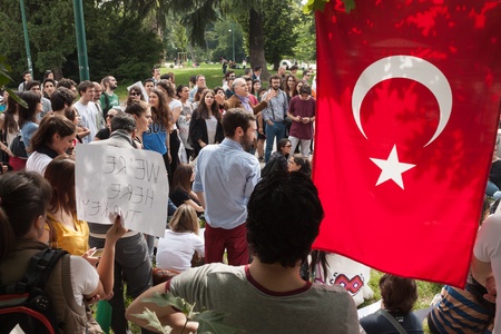 MILAN, ITALY - JUNE 1: Turkish people protest in defence of democracy and against prime minister Erdogan for the violent attacks by riot police at Gezi Park (Istanbul) in Milan JUNE 1, 2013のeditorial素材