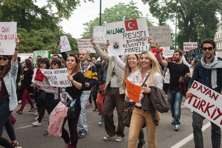 MILAN, ITALY - JUNE 1: Turkish people protest in defence of democracy and against prime minister Erdogan for the violent attacks by riot police at Gezi Park (Istanbul) in Milan JUNE 1, 2013のeditorial素材