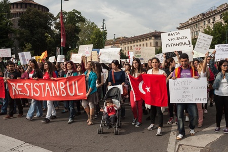 MILAN, ITALY - JUNE 1: Turkish people protest in defence of democracy and against prime minister Erdogan for the violent attacks by riot police at Gezi Park (Istanbul) in Milan JUNE 1, 2013のeditorial素材