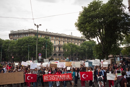 MILAN, ITALY - JUNE 1: Turkish people protest in defence of democracy and against prime minister Erdogan for the violent attacks by riot police at Gezi Park (Istanbul) in Milan JUNE 1, 2013のeditorial素材