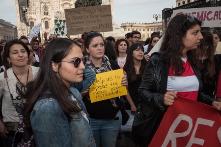 MILAN, ITALY - JUNE 1: Turkish people protest in defence of democracy and against prime minister Erdogan for the violent attacks by riot police at Gezi Park (Istanbul) in Milan JUNE 1, 2013のeditorial素材