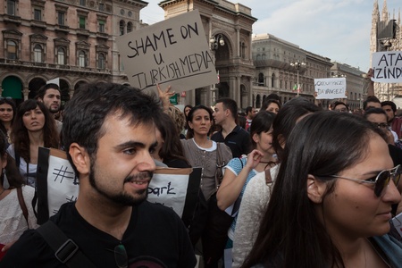 MILAN, ITALY - JUNE 1: Turkish people protest in defence of democracy and against prime minister Erdogan for the violent attacks by riot police at Gezi Park (Istanbul) in Milan JUNE 1, 2013のeditorial素材