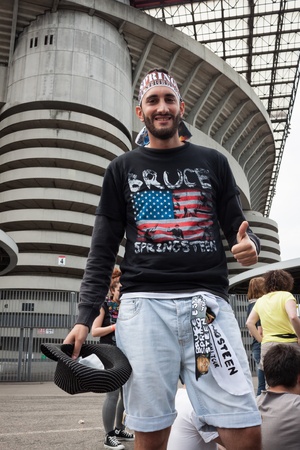 MILAN, ITALY - JUNE 3: Thousands of fans gather outside the stadium waiting for the gates to open at Bruce Springsteen world tour in Milan JUNE 3, 2013のeditorial素材